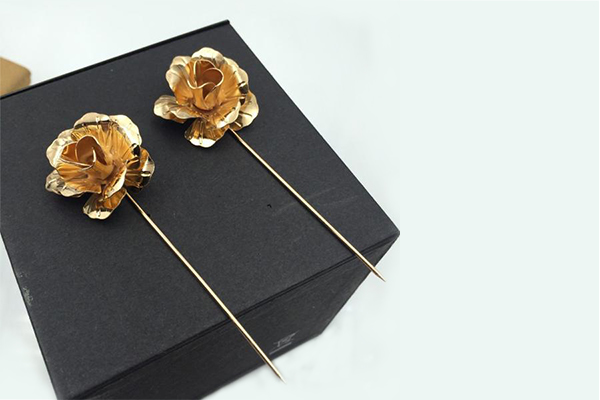 Gold brooches