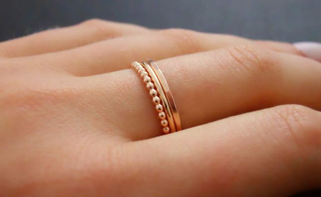 gold middle finger ring
