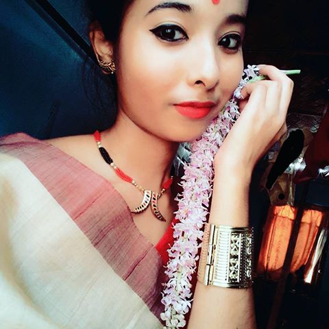Assamese woman wearing gold jewellery