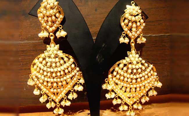 Gold Jadau earrings