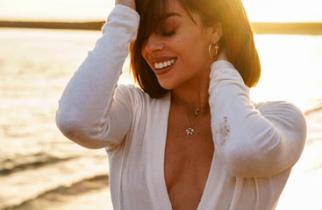 woman wearing gold jewellery
