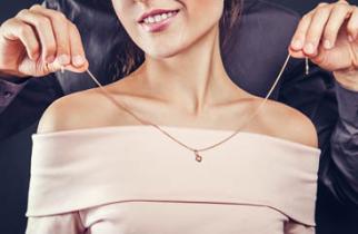 woman wearing gold jewellery
