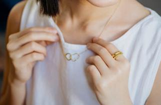 Woman with gold necklace