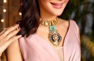 woman wearing gold jewellery