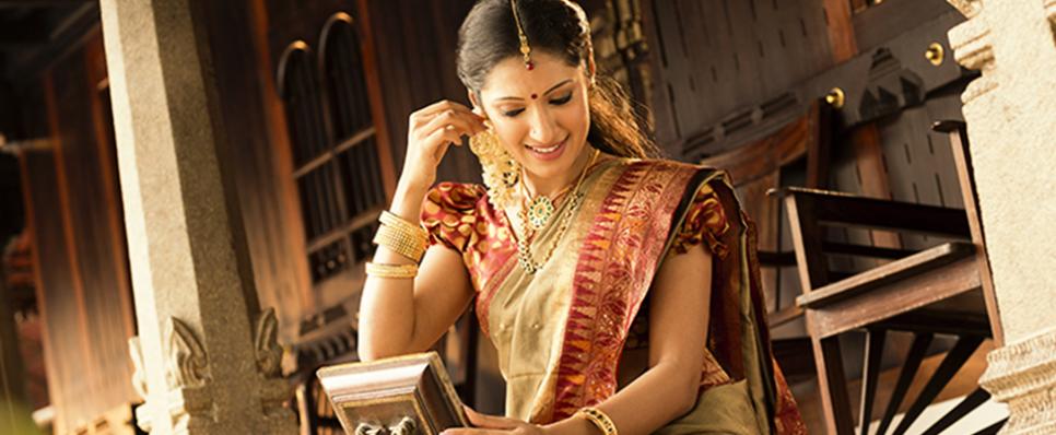 Woman wearing gold ornaments