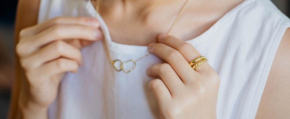 Woman with gold necklace