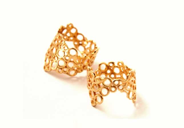 Contemporary designer gold ring